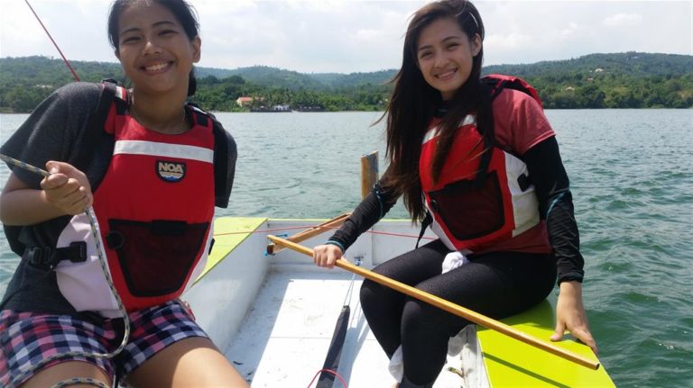 Learning to sail on an oz Goose Taal Lake Philippines